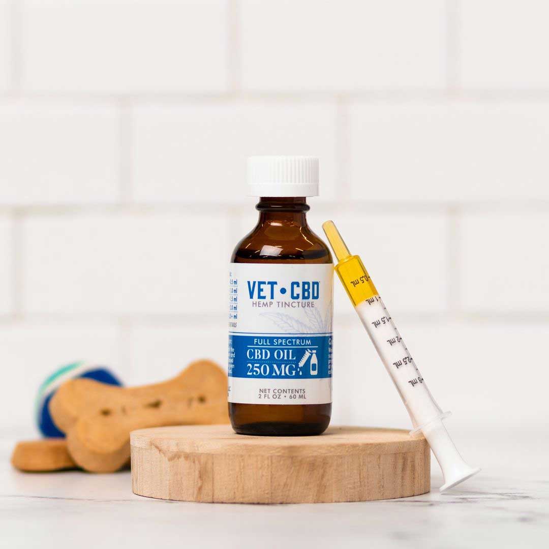 VETCBD Hemp Oil product in packaging alongside dropper – An image showing the oil bottle with a dropper against the packaging, ideal for pet owners seeking precise dosing