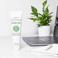 Relaxing moment with Martha Stewart CBD Daily De-Stress Cream placed on a working table, promoting relaxation and self-care