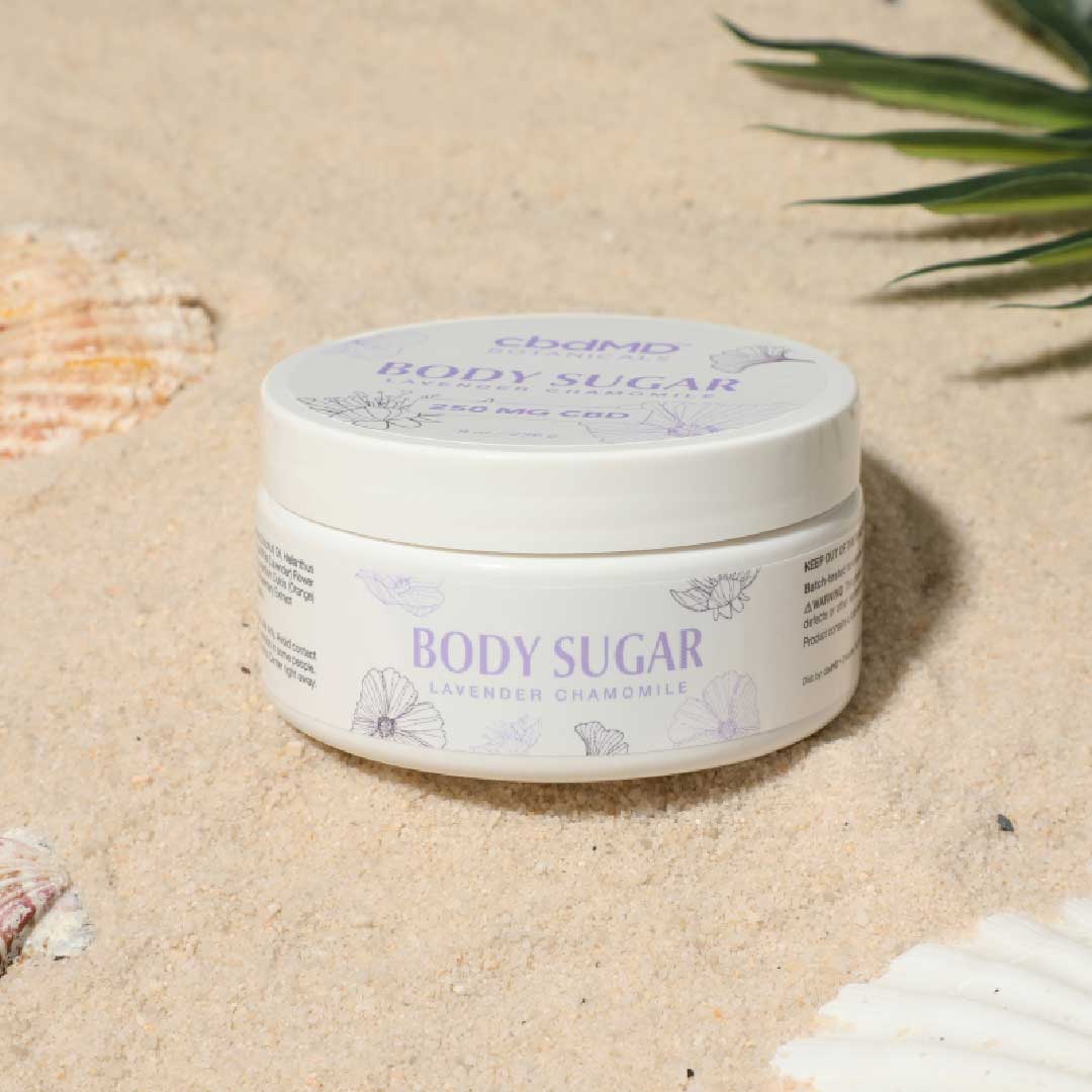 CBDmd Botanicals CBD Body Sugar Scrub packaging, highlighting the product's natural ingredients and CBD infusion for skin wellness
